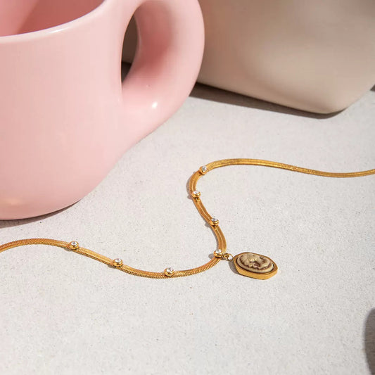 Gilded Shadow Reflecting Necklace